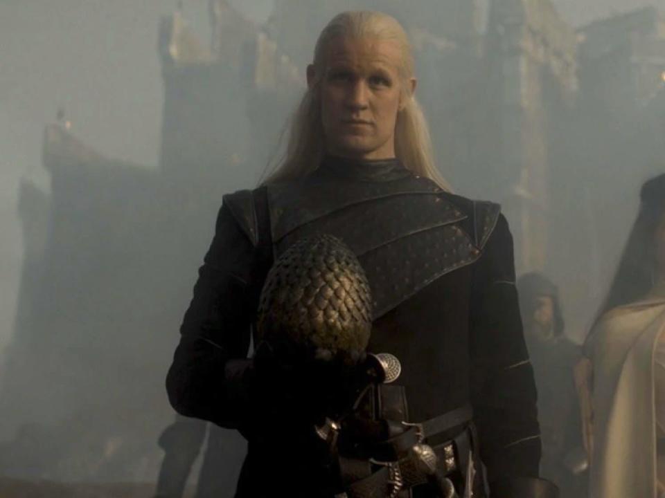 Matt Smith as Daemon Targaryen holding Dreamfyre's egg.