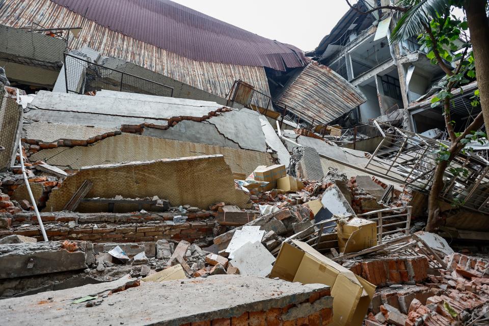 The wreckage of a printing company’s factory after it collapsed following a magnitude 7.5 earthquake in New Taipei, Taiwan (EPA)