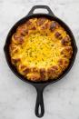 <p>This cheesy snack is the best thing to ever happen to your skillet.<br></p><p>Get the recipe from <a href="https://www.countryliving.com/cooking/recipe-ideas/recipes/a49208/pretzel-ring-beer-cheese-dip-recipe/" rel="nofollow noopener" target="_blank" data-ylk="slk:Delish;elm:context_link;itc:0;sec:content-canvas" class="link ">Delish</a>.</p>