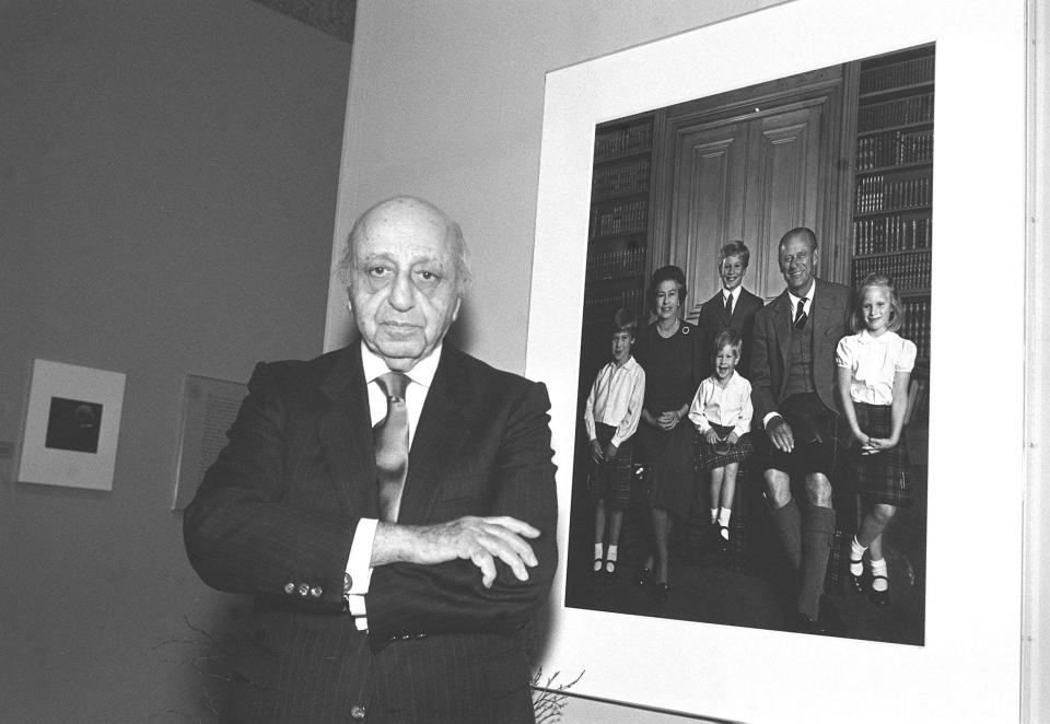 Yousuf Karsh with his royal family portrait
