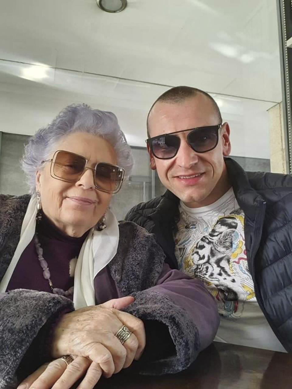 This undated photo shows Hannelore Fischer and her grandson, José Miguel Cruz da Costa in Braga, Portugal. Born amid the ruins of wartime Vienna, Hannelore Fischer was sent as a small child to Portugal where her flamboyant manner and outstanding soprano voice would later help her build a life far from her place of birth. She died of COVID-19 on March 25, 2020, after four days on a ventilator at Braga's hospital. ( José Miguel Cruz da Costa via AP)