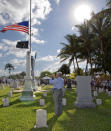 <p>Former music teacher Jim Doepke plays “Taps” on Monday, May 30, 2016, at the conclusion of a Memorial Day ceremony in Key West, Fla. The naval color guard and officers from Naval Air Station Key West led the program in front of the USS Maine Memorial in the city’s historic cemetery. (Photo: Rob O’Neal/The Citizen via AP) </p>