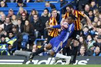 Chelsea's Didier Drogba (C) challenges Bradford City's Rory McArdle (R) during their FA Cup fourth round soccer match at Stamford Bridge in London January 24, 2015. REUTERS/Stefan Wermuth (BRITAIN - Tags: SPORT SOCCER)