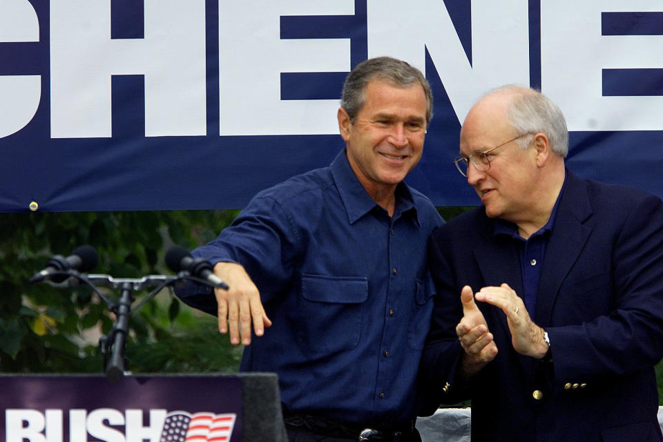 In this file photo of Sept. 4, 2000, during his first run for president, Texas Gov. George W. Bush appears with his running-mate Dick Cheney in Naperville, Ill., where Bush used an expletive to describe a reporter while talking to Cheney, unaware an open microphone captured his remark. (AP Photo/Damian Dovarganes, File)