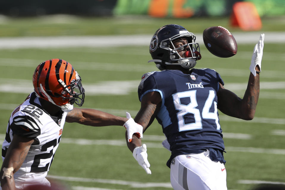 Tennessee Titans' Corey Davis (84) is defended by Cincinnati Bengals' William Jackson (22) in last week's loss. (AP Photo/Jay LaPrete)