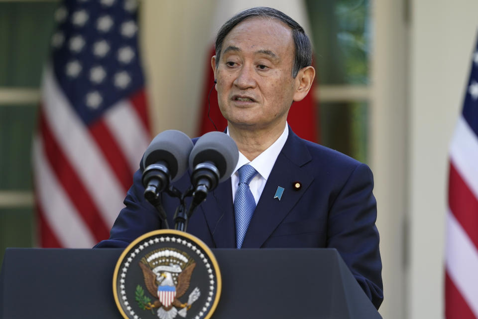 Japanese Prime Minister Yoshihide Suga, speaks at a news conference with President Joe Biden in the Rose Garden of the White House, Friday, April 16, 2021, in Washington. (AP Photo/Andrew Harnik)