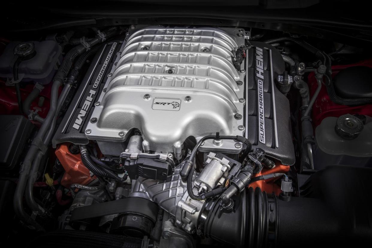 the dodge challenger srt hellcat carries a supercharged 62 liter hemi® v 8 producing 717 hp and 656 lb ft of torque