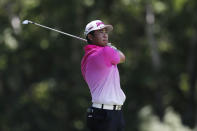 Hideki Matsuyama from Japan hits from the ninth tee during the second round of the Rocket Mortgage Classic golf tournament, Friday, July 3, 2020, at the Detroit Golf Club in Detroit. (AP Photo/Carlos Osorio)