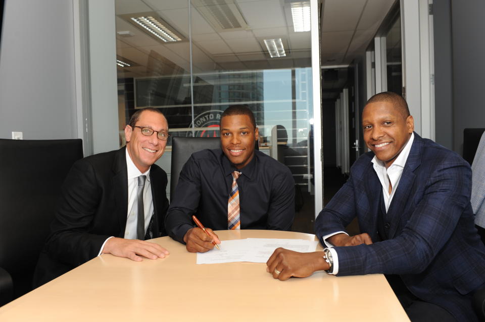 Andy Miller (left) negotiated more than $1 billion in contracts for Kyle Lowry (center) and scores of other NBA players. Now, he's had his certification as an agent revoked. (Getty)