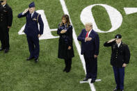 President Donald Trump, second from right, and first lady Melania Trump attend the NCAA College Football Playoff national championship game Monday, Jan. 13, 2020, in New Orleans. (AP Photo/Eric Gay)