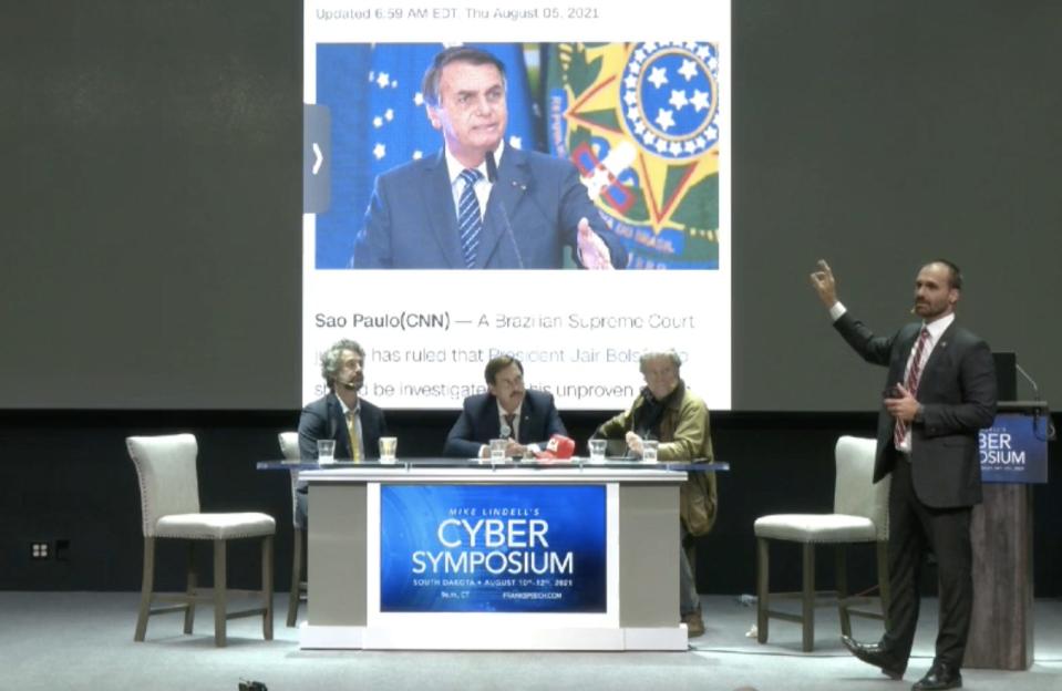 Mike Lindell Eduardo Bolsonaro Steve Bannon at cyber symposium in South Dakota