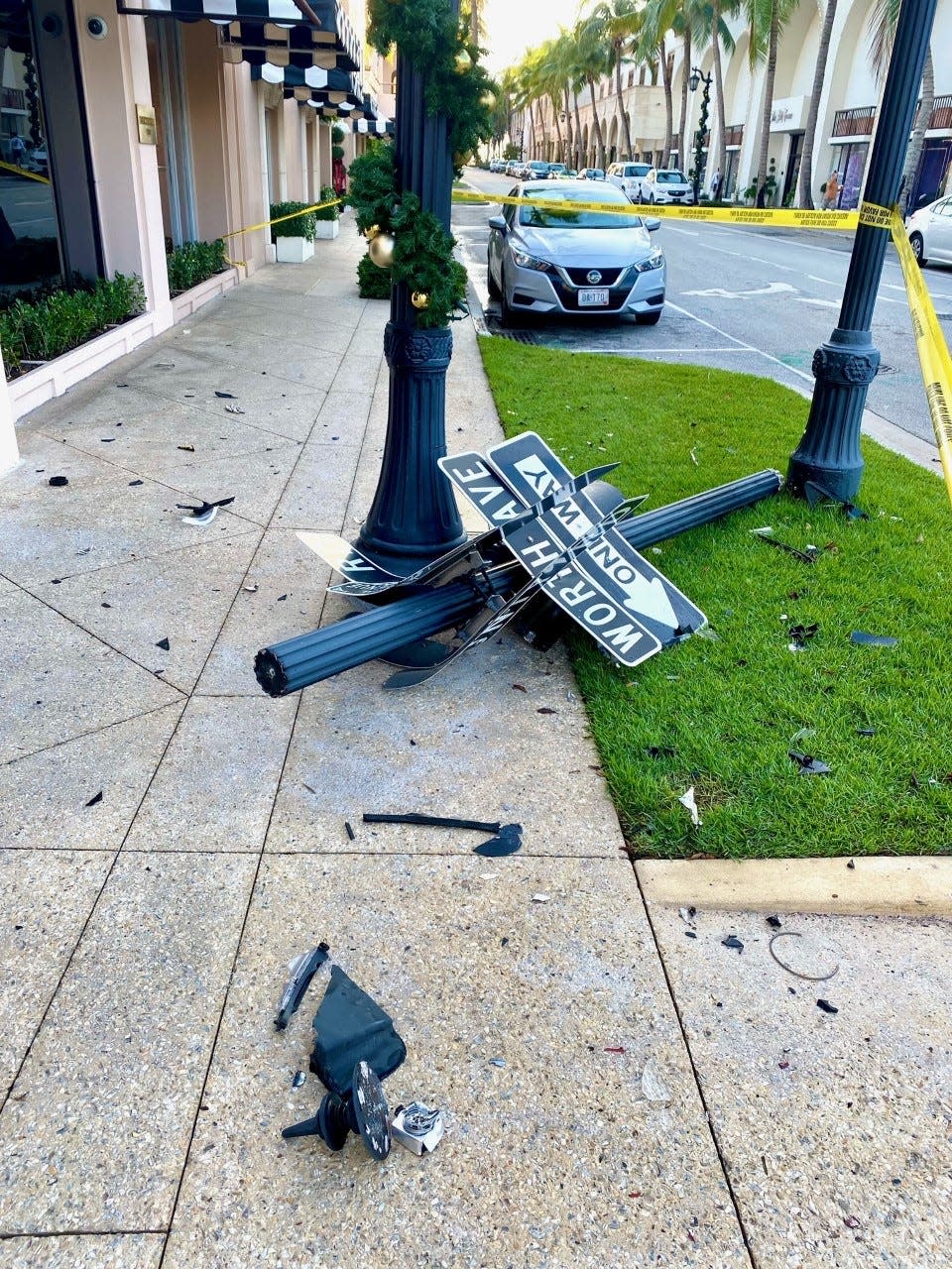 Resident John David Corey took this picture of a damaged sign at today's crash scene while out for his morning run at about 7:45 a.m., he said.