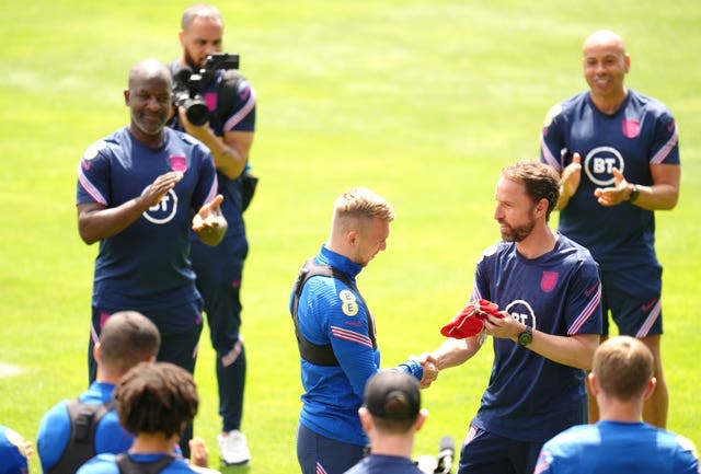 Jarrod Bowen receives his cap from England manager Gareth Southgate