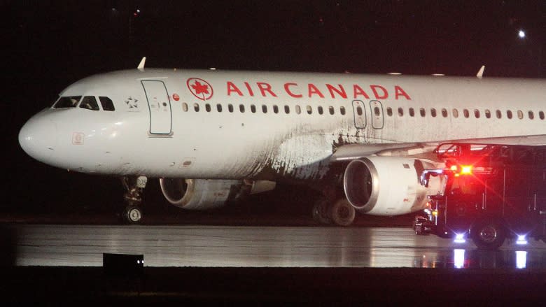 TSB not ruling out weather as factor after plane slides off runway in Toronto