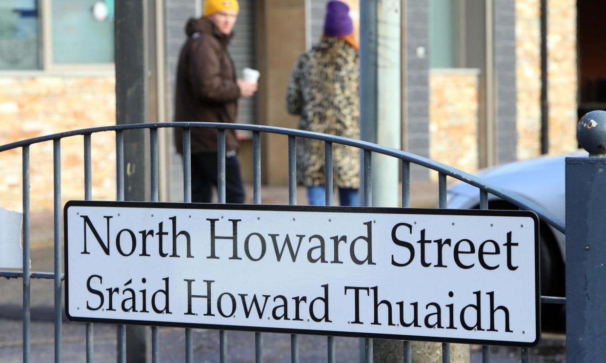 <span>An Irish and English street sign in west Belfast.</span><span>Photograph: Paul McErlane/EPA</span>