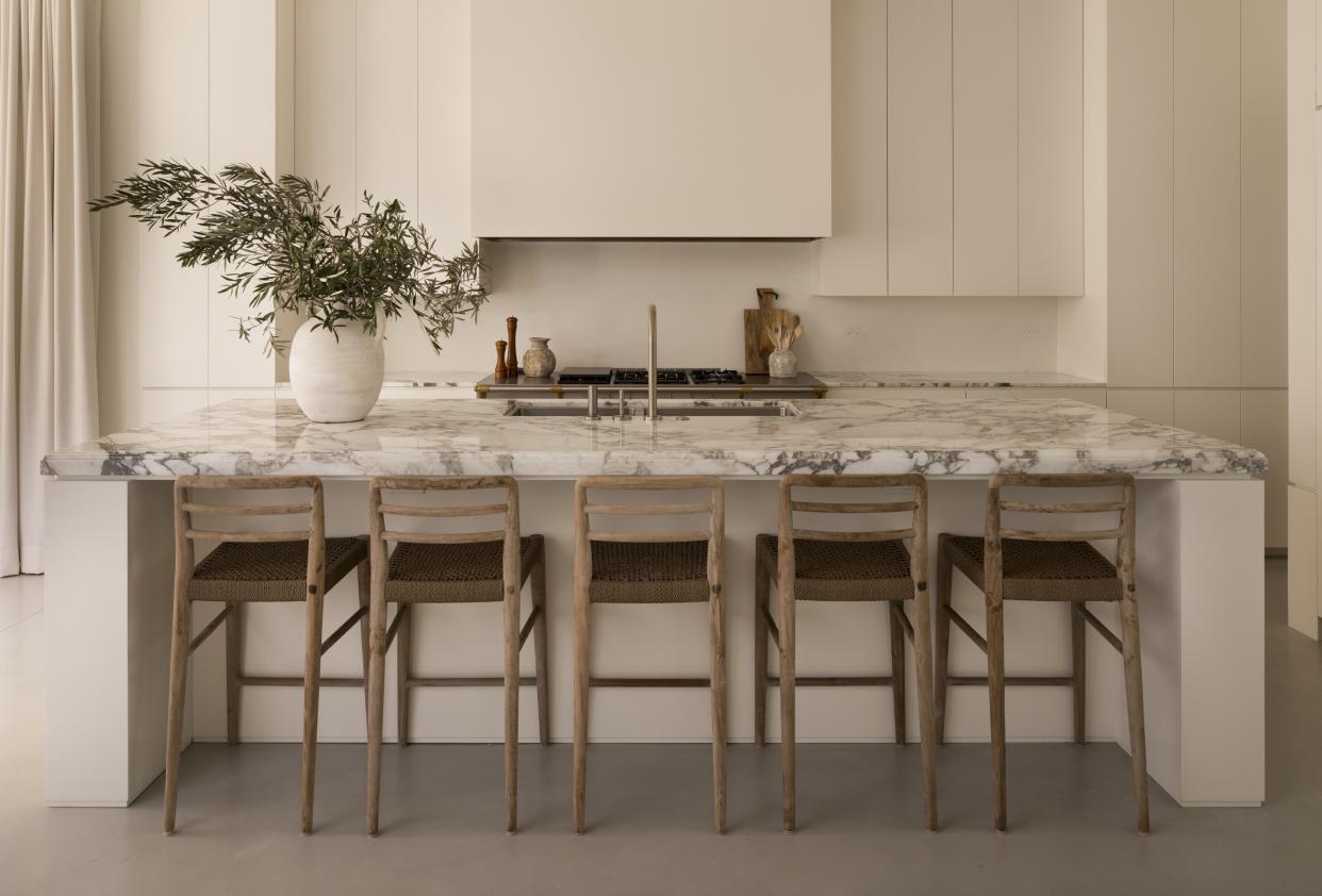  A kitchen island with added seating. 