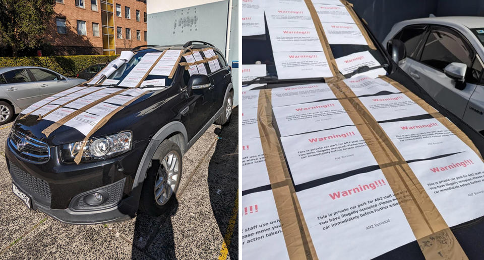 Illegally parked car covered in warning signs in ANZ car spot