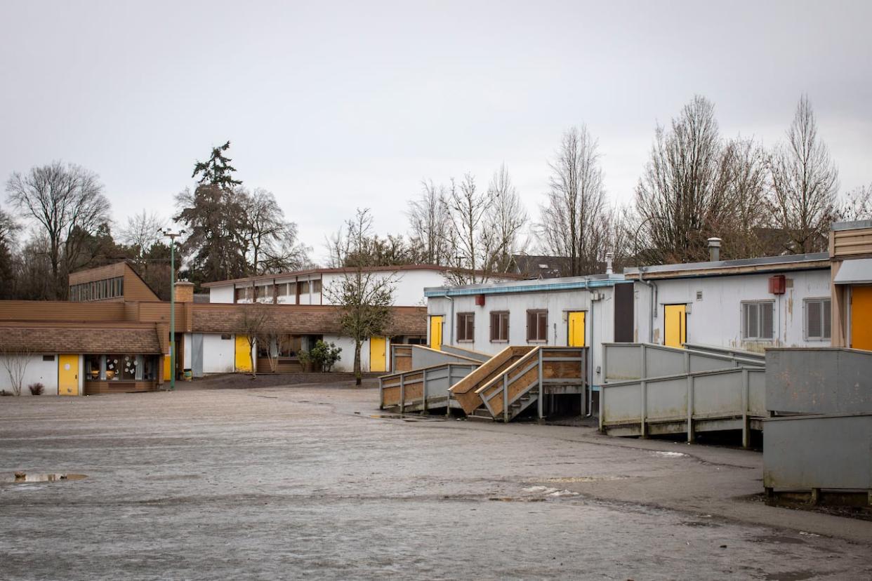 Simon Fraser Elementary has one of the largest kindergarten wait-lists because it's the catchment school for the Olympic Village area, despite the school being a 25-minute walk away.  (Ben Nelms/CBC - image credit)