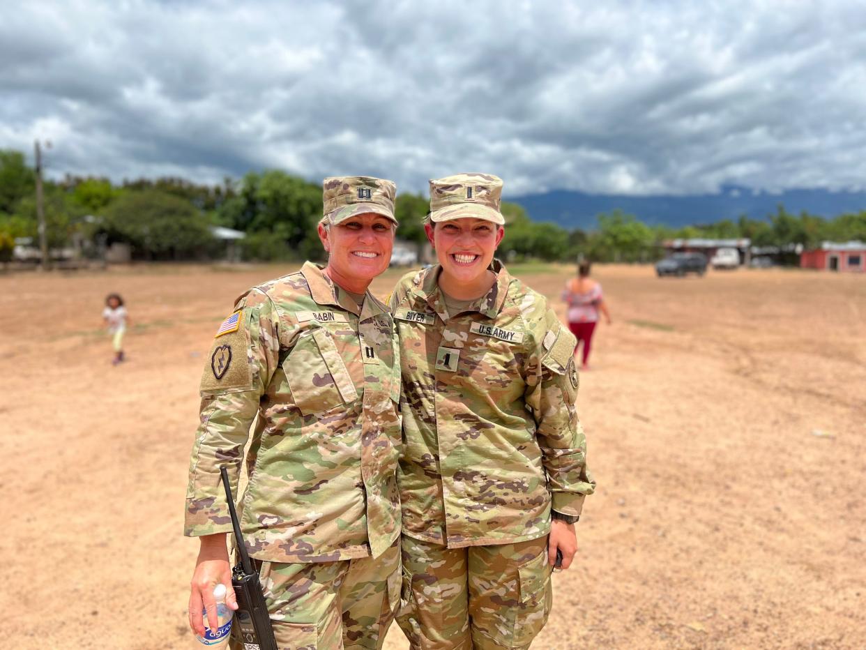 Capt. Hallie Babin, left, and Gabrielle Boyer, who are both from Ashland, met up in Soto Cano Air Base in Honduras.