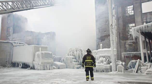 Surrounding vehicles were also covered with thick ice. Pic: Reuters