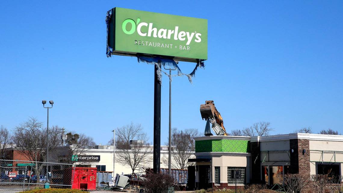 The sign on the old O’Charley’s location at 2895 Richmond Road had been covered over since it closed in 2020 but had since torn away. The chain restaurant location is under demolition, Monday, March 27, 2023 by demo contractor May Demolition.