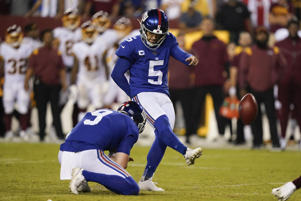 New York Giants kicker Graham Gano (5) kicks a field goal during the second half of an NFL football game against the Washington Football Team, Thursday, Sept. 16, 2021, in Landover, Md. (AP Photo/Alex Brandon)