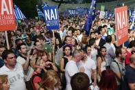 Pro-Europe supporters gather in front of Panathenian stadium during a 'YES' rally in Athens on July 3, 2015