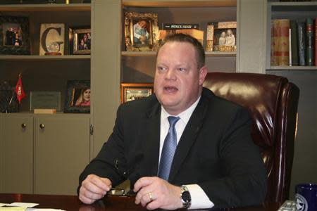 Rogers, Arkansas Mayor Greg Hines speaks during an interview in Rogers December 4, 2013. REUTERS/Andy Sullivan