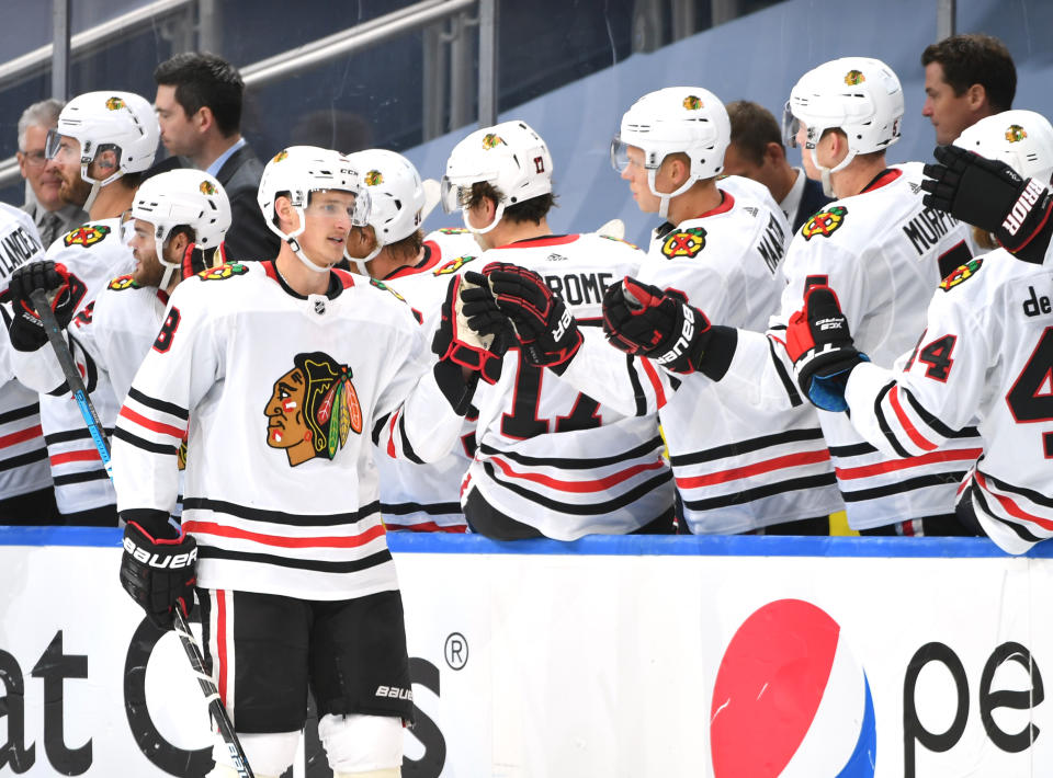 EDMONTON, ALBERTA - AUGUST 01:  Dominik Kubalik #8 of the Chicago Blackhawks celebrates his goal with teammates during the second period of Game One of the Western Conference Qualification Round against the Edmonton Oilers at Rogers Place on August 01, 2020 in Edmonton, Alberta. (Photo by Andy Devlin/NHLI via Getty Images)