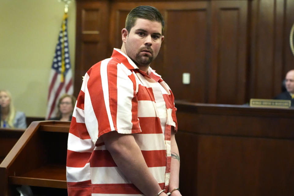 Daniel Opdyke, a former Rankin County Sheriff's Deputy and one of six former Mississippi law enforcement officers who pleaded guilty to a long list of state and federal charges, looks for his family in the Rankin County Circuit Court after being sentenced in state court for his involvement in the 2023 racially motivated torture of two Black men, Wednesday, April 10, 2024, in Brandon, Miss. Time served for the state convictions will run concurrently with the federal sentences, and the men will serve their time in federal penitentiaries. (AP Photo/Rogelio V. Solis)