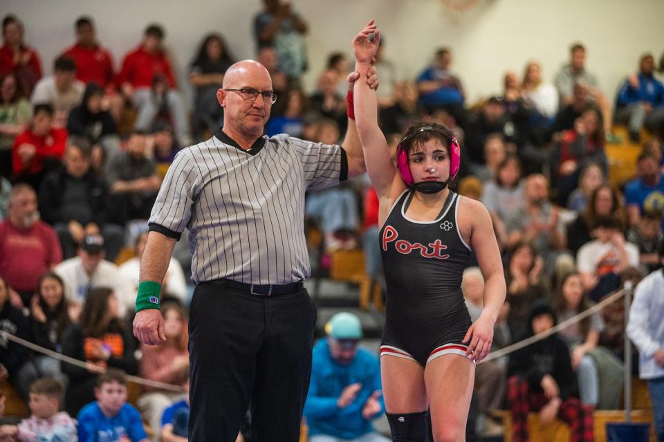 Port Jervis' Charlie Wylie is presented as the 102-pound winner at the Section 9 Division 2 wrestling championship at SUNY Ulster on Sunday. Wylie was the defending champion.
