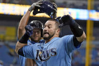 Tampa Bay Rays' Mike Zunino, front, celebrates his two-run home run off Boston Red Sox starting pitcher Garrett Richards with Brett Phillips during the second inning of a baseball game Wednesday, June 23, 2021, in St. Petersburg, Fla. (AP Photo/Chris O'Meara)