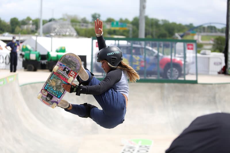 FILE PHOTO: Skateboarders practice during a stop on the Dew Tour