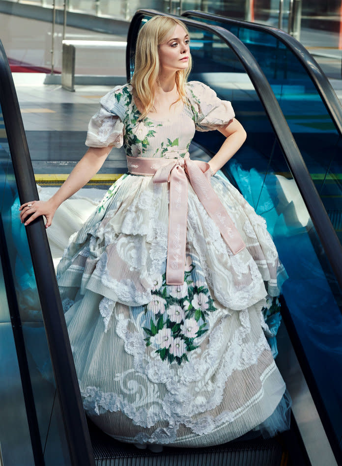 <p>Fanning in Dolce &amp; Gabbana Alta Moda dress. Tiffany &amp; Co. bracelet and ring. Photographed by Pamela Hanson/LGA Management.</p>