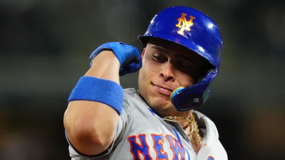 May 27, 2023;  Denver, Colorado, USA;  New York Mets wide receiver Francisco Alvarez (4) reacts after hitting a three-run home run against the Colorado Rockies in the sixth inning at Coors Field.