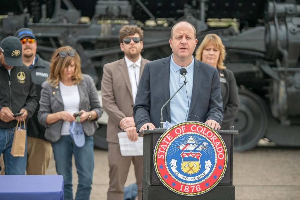 Gov. Jared Polis delivers remarks before signing the Railroad Safety Requirements bill at the Pueblo Union Depot on Friday, May 10, 2024.