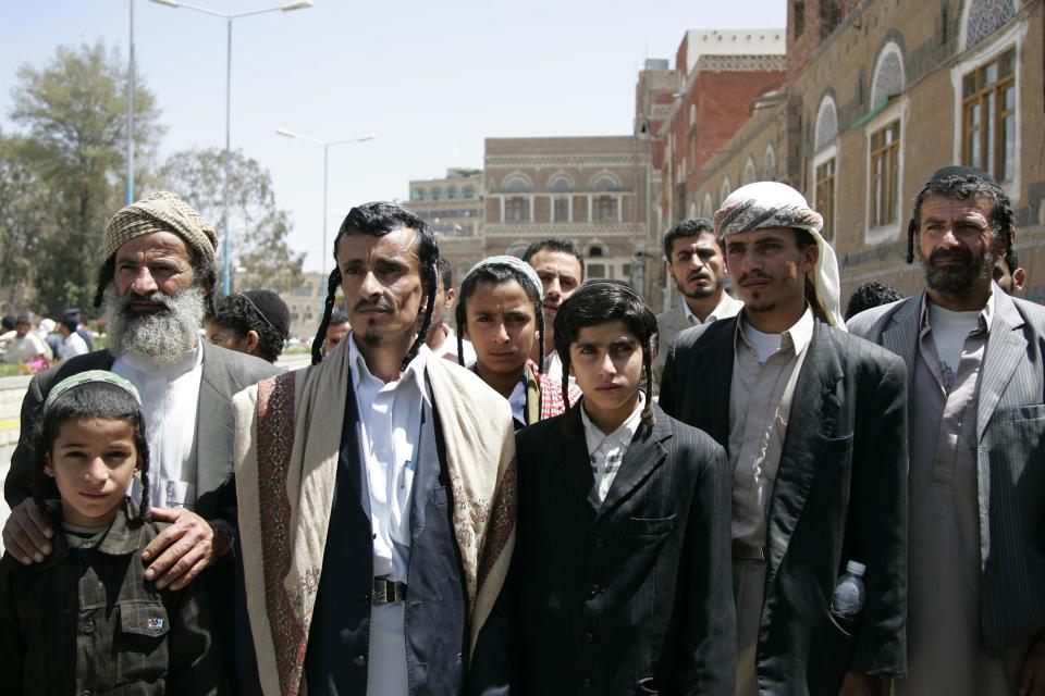 Yemeni Jews demonstrate demanding the resumption of government financial and food aid to Jewish families living in the capital city outside the Cabinet office in Sanaa in this March 10, 2009 file photo. A few worried families are all that remain of Yemen's ancient Jewish community, and they too may soon flee after a Shi'ite Muslim militia seized power in the strife-torn country this month. Harassment by the Houthi movement - whose motto is "Death to America, death to Israel, curse the Jews, victory to Islam" - caused Jews in recent years to largely quit the northern highlands they shared with Yemen's Shi'ites for millennia. But political feuds in which the Jews played no part escalated last September into an armed Houthi plunge into the capital Sanaa, the community's main refuge from which some now contemplate a final exodus. REUTERS/Khaled Abdullah/Files (YEMEN - Tags: CIVIL UNREST POLITICS RELIGION SOCIETY)