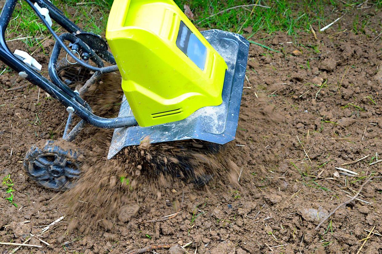 vegetable garden preparation using a rototiller