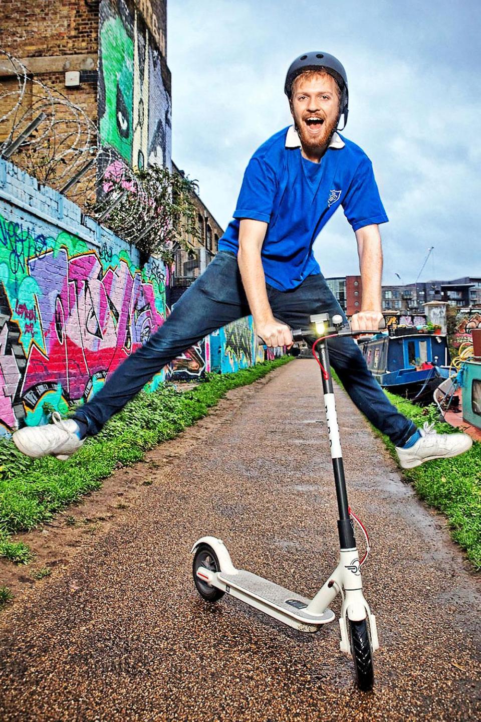 Evening Standard writer Samuel Fishwick trying out Bird's electric scooters in London