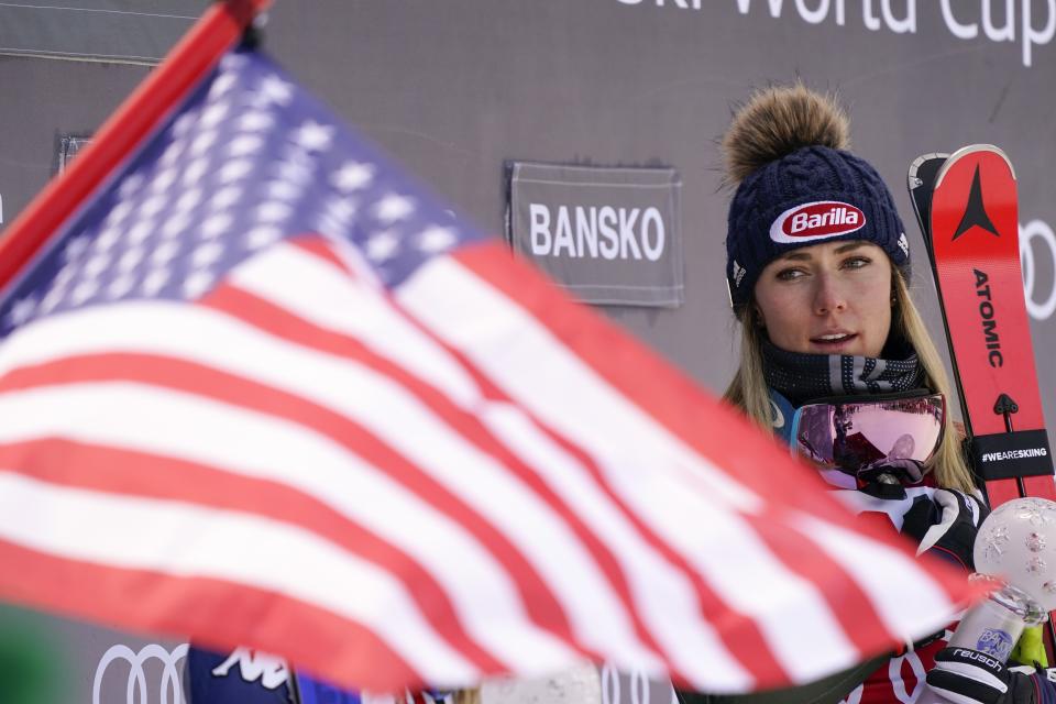United States' Mikaela Shiffrin stands on the podium after winning an alpine ski, women's World Cup super-G, in Bansko, Bulgaria, Sunday, Jan. 26, 2020. (AP Photo/Giovanni Auletta)