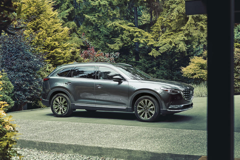 This photo provided by Mazda shows the 2023 Mazda CX-9. A midsize 3-row SUV that will be discontinued for 2024. (Patrick Curtet/Courtesy of Mazda North American Operations via AP)