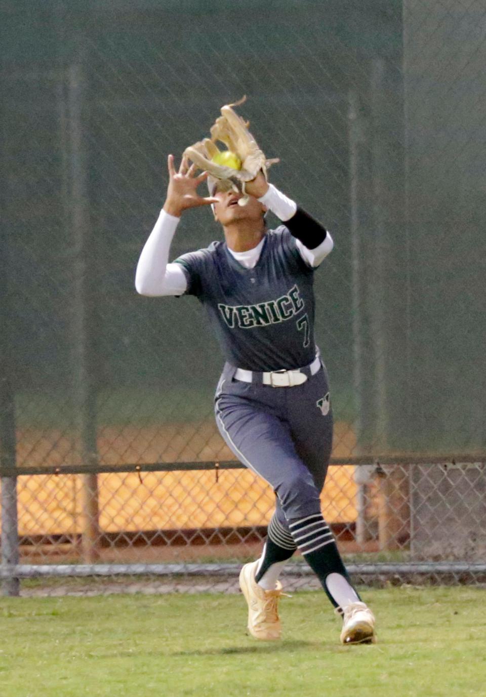 Venice left fielder Raionna Smith makes a catch against Lakewood Ranch in the Class 7A-District 8 softball final Thursday night at Lakewood Ranch High.