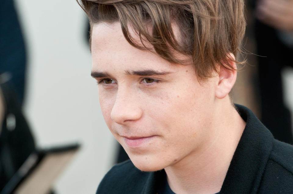 Brooklyn Beckham broke his collar bone snowboarding, but he handled it like a champ