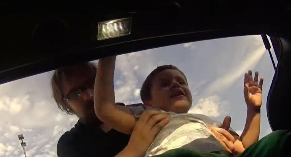 Boguslaw Matlak, 28, who was filmed placing his three-year-old son in the boot of his car claims it was a social experiment to see if people would intervene. Source: NBC 5