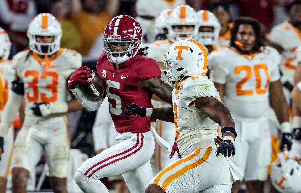 Alabama defensive back Jalyn Armour-Davis (5) carries the ball after an interception against Tennessee during their game at Bryant-Denny Stadium.