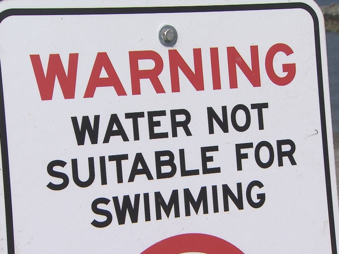 Two shorelines in Greater Victoria have had signage posted along beaches after heavy rains caused wastewater to be discharged directly into the ocean. (David Horemans/CBC - image credit)