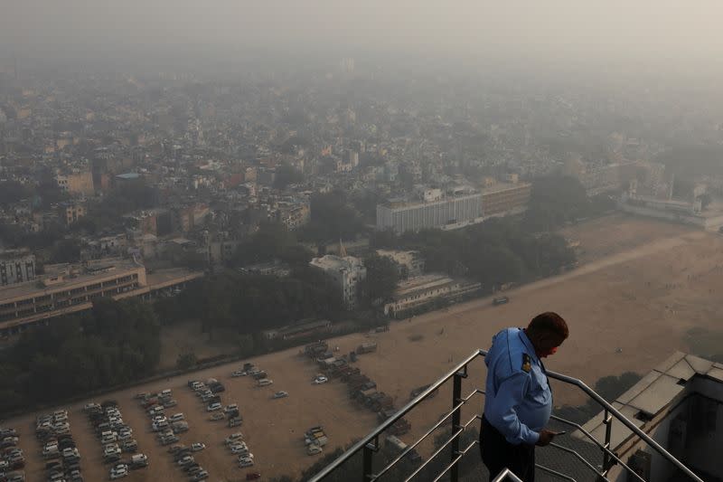 Buildings are seen shrouded in smog in New Delhi