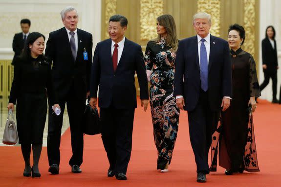 Donald and Melania Trump arrive for the state dinner.