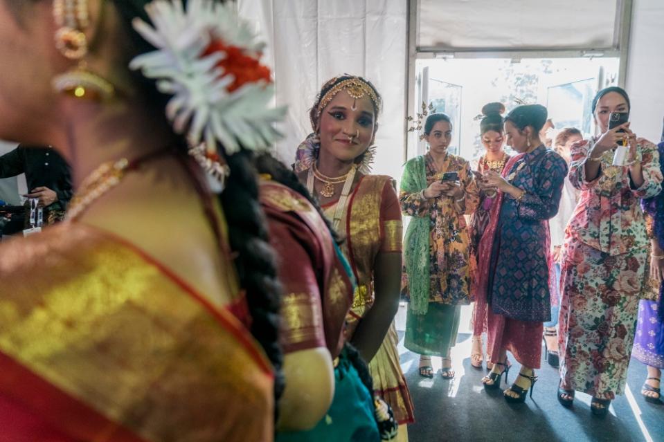 Participants get ready to perform during the Madani Government One Year Anniversary Programme at the Bukit Jalil National Stadium December 9, 2023. — Picture by Shafwan Zaidon