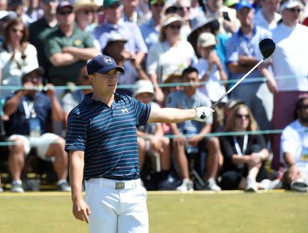 Jun 21, 2015; University Place, WA, USA; Jordan Spieth reacts after hitting his tee shot on the 1st hole in the final round of the 2015 U.S. Open golf tournament at Chambers Bay. Mandatory Credit: Michael Madrid-USA TODAY Sports